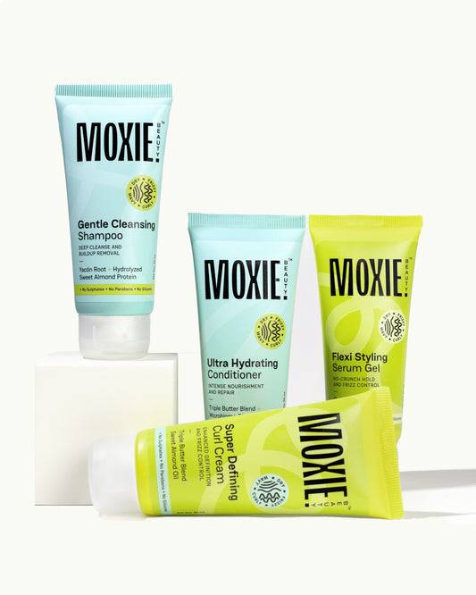The Moxie Curly Routine Travel Size with shampoo, conditioner, curl cream, and styling serum